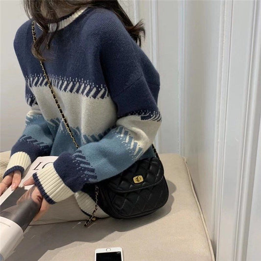 Suéter de cuello redondo con contraste de color que reduce la edad